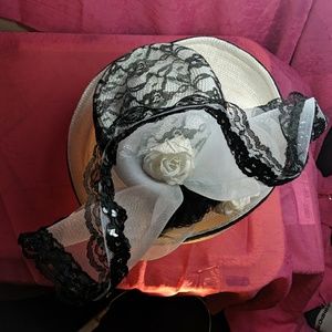 White fancy straw hat.